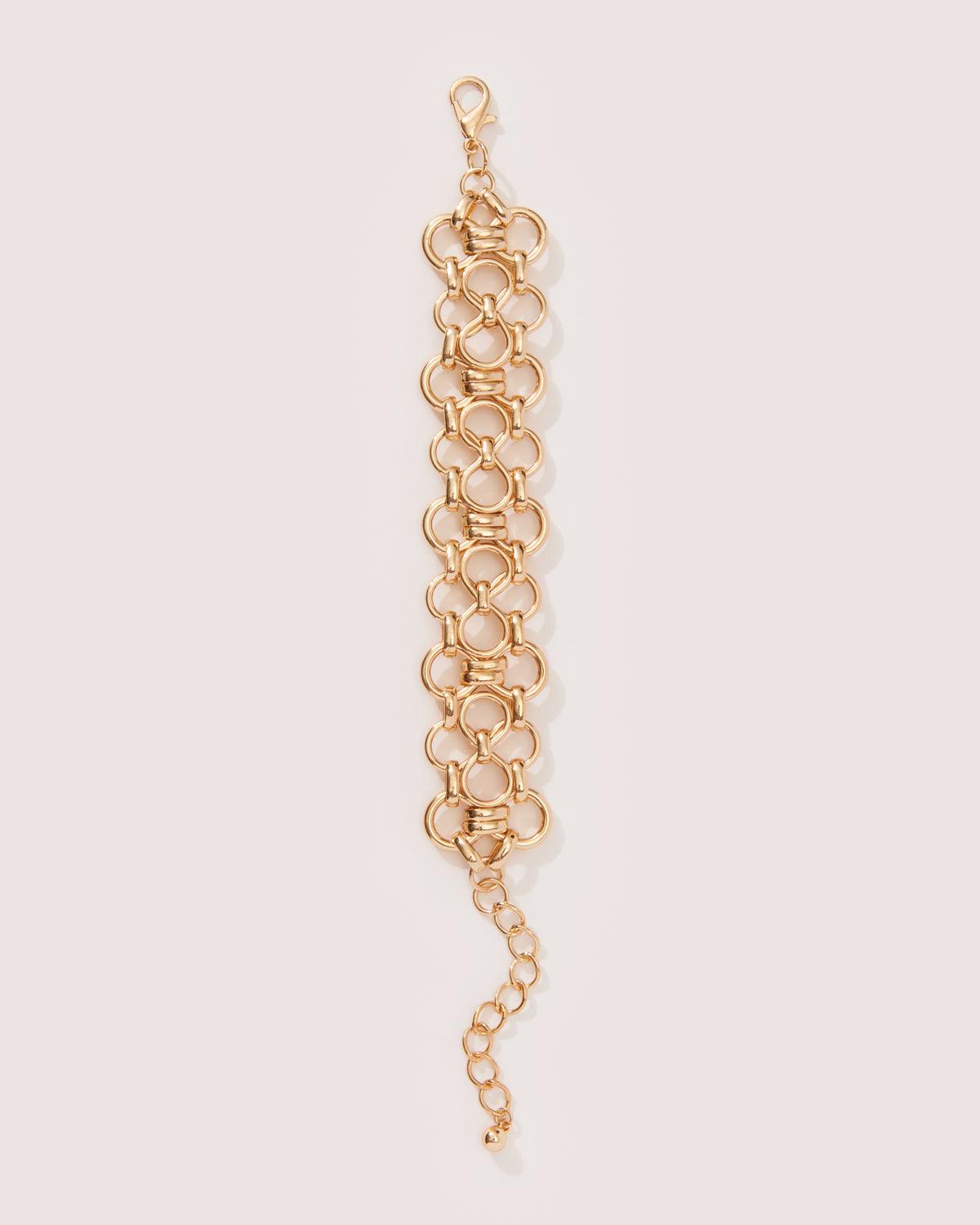 14k gold plated patterned flat chain bracelet, measuring 6.5 inches in length. Includes a 2.5 inch extender with a lobster clasp closure. 