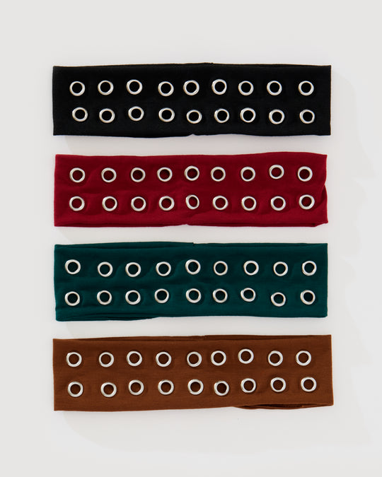 Mini grommet headband in faux leather with gunmetal grommet hardware