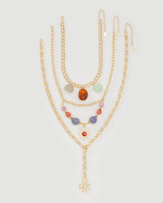 Solstice pre-layered gold necklace with stone and pendant detail