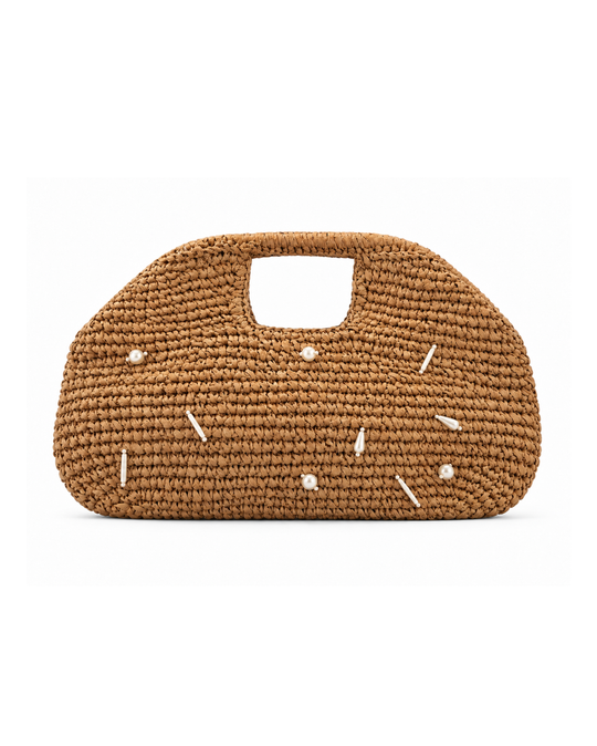 Khaki crocheted straw clutch in a crescent shape with a cut-out top handle and scattered pearl and white bead detail
