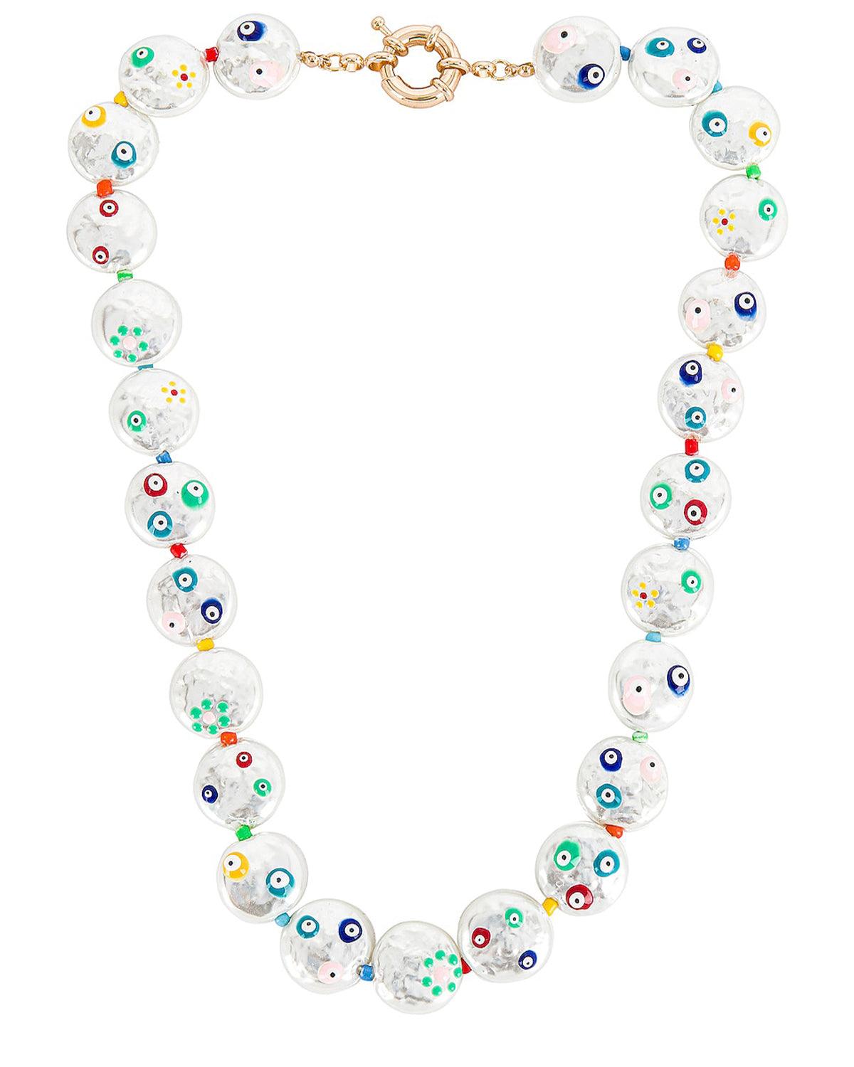 14k gold plated freshwater pearl necklace with a  spring clasp closure. Pearls have colorful dotted detailing. Necklace measures 18.5 inches long. 